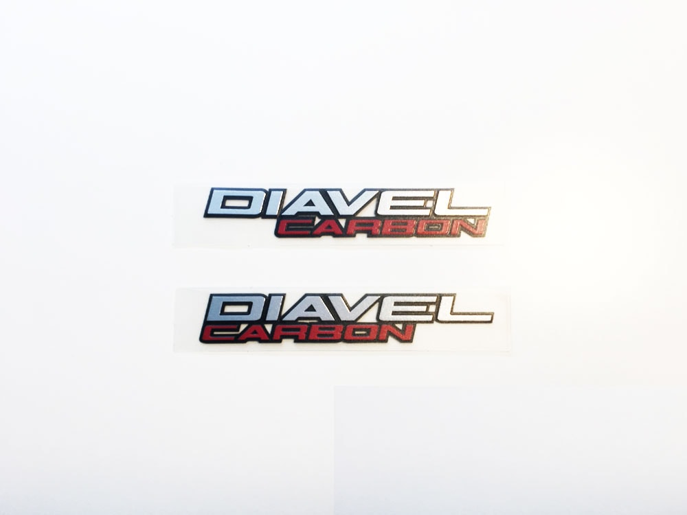 EMBLEM DIAVEL CARBON SINISTRO
